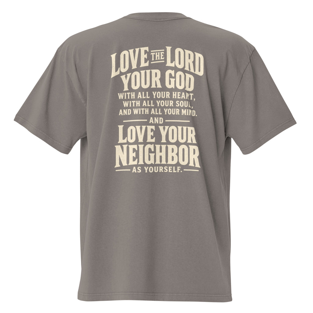 Men’s faded light gray oversized Christian t-shirt featuring a large “Love the Lord your God” and “Love your neighbor as yourself” scripture design on the back.