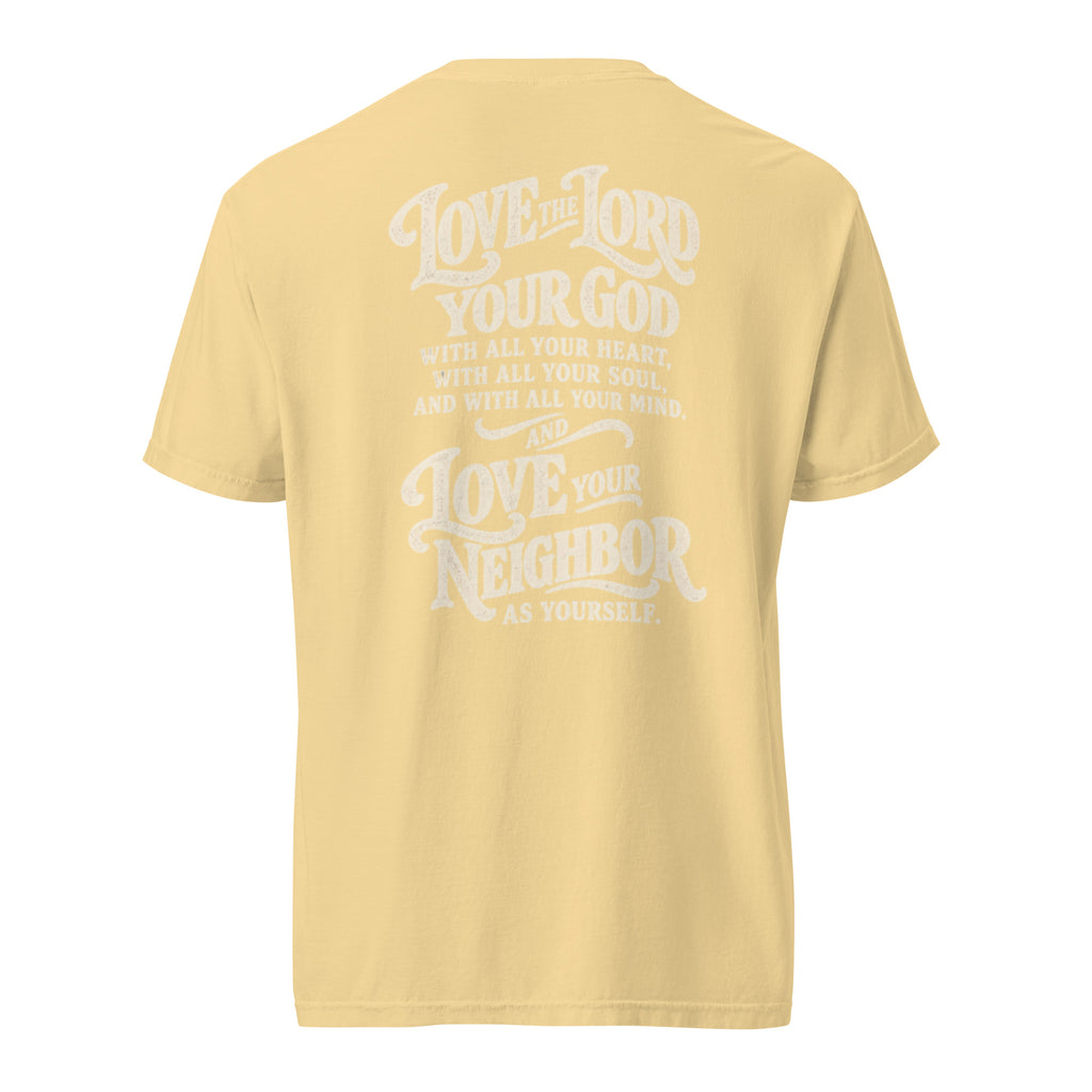 Muted yellow Comfort Colors Christian t-shirt with “Love God Love People” printed on the front chest and Matthew 22:37–39 inspired scripture design on the back.